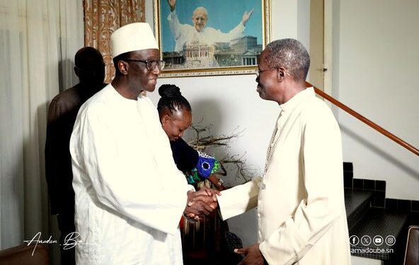 Amadou Ba chez l'Archevêque de Dakar